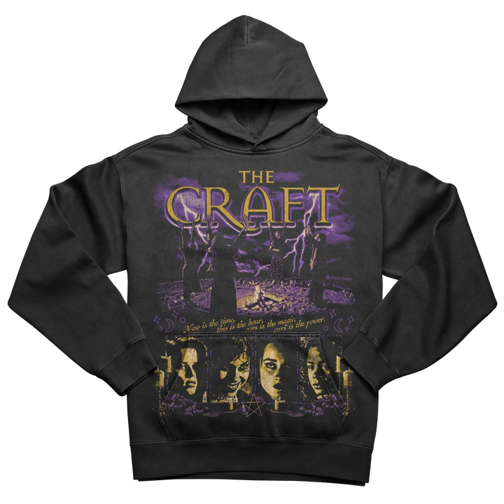 Black hooded sweatshirt with a purple and gold ’The Craft’ graphic print.