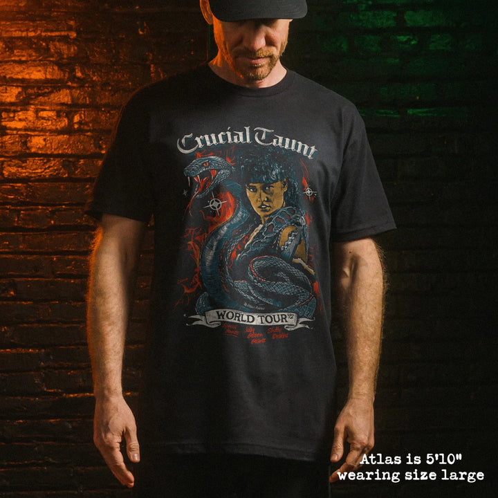 Male model wearing black premium tee with crucial taunt graphic 