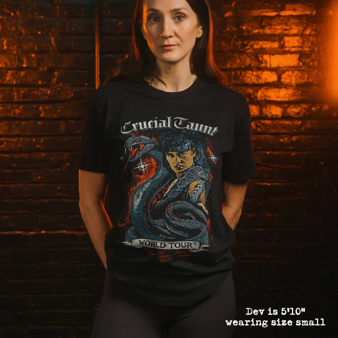 model wearing black premium tee with crucial taunt graphic 