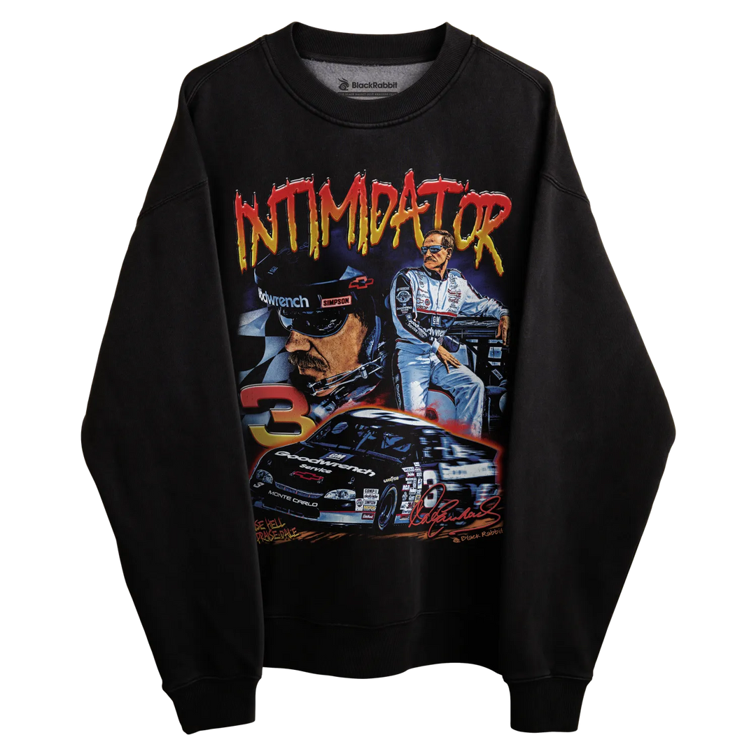Black long-sleeved sweatshirt with ’intimidator’ graphic design featuring a race car and driver, material appears to be cotton or polyester blend.