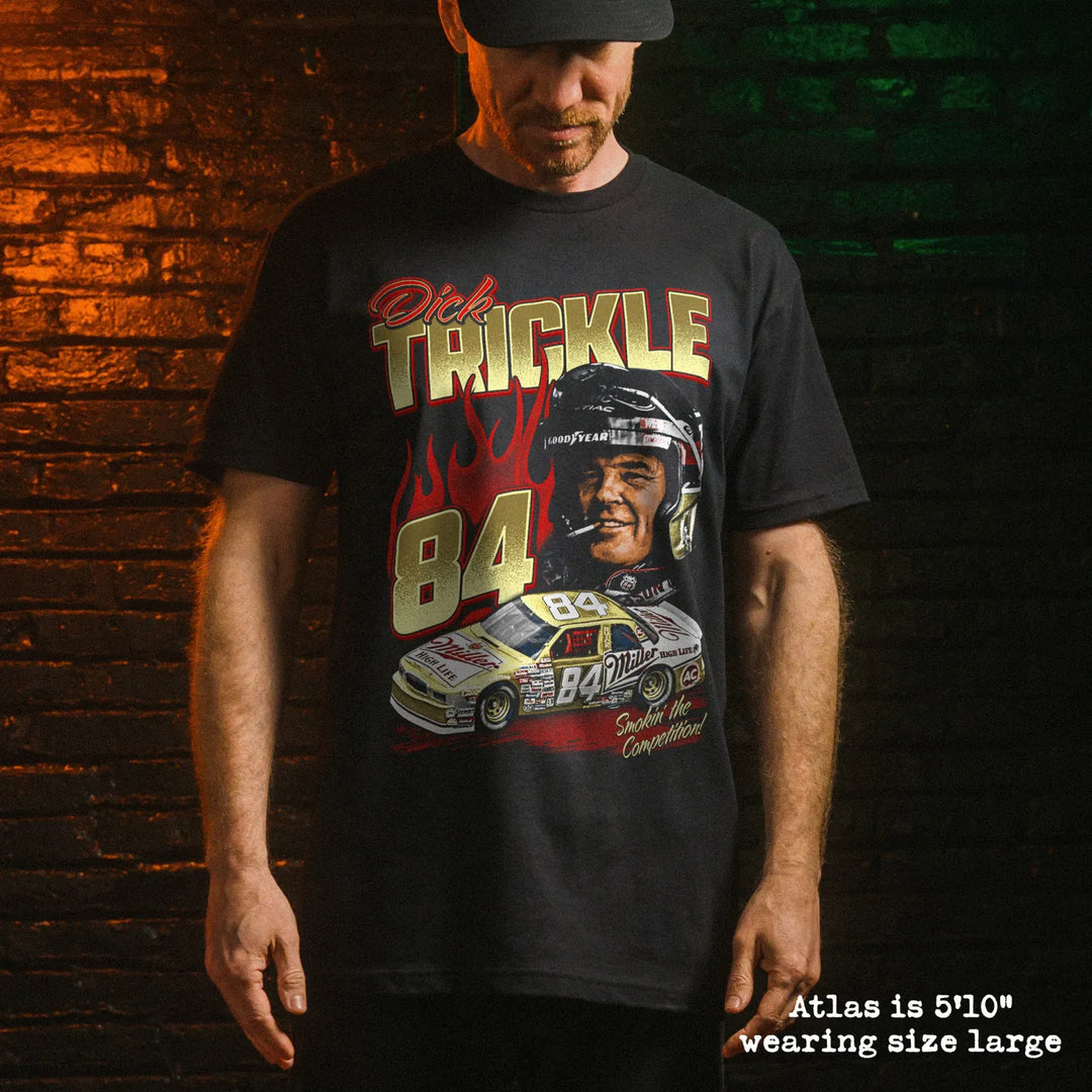 Male model wearing black premium tee with dick trickle graphic 