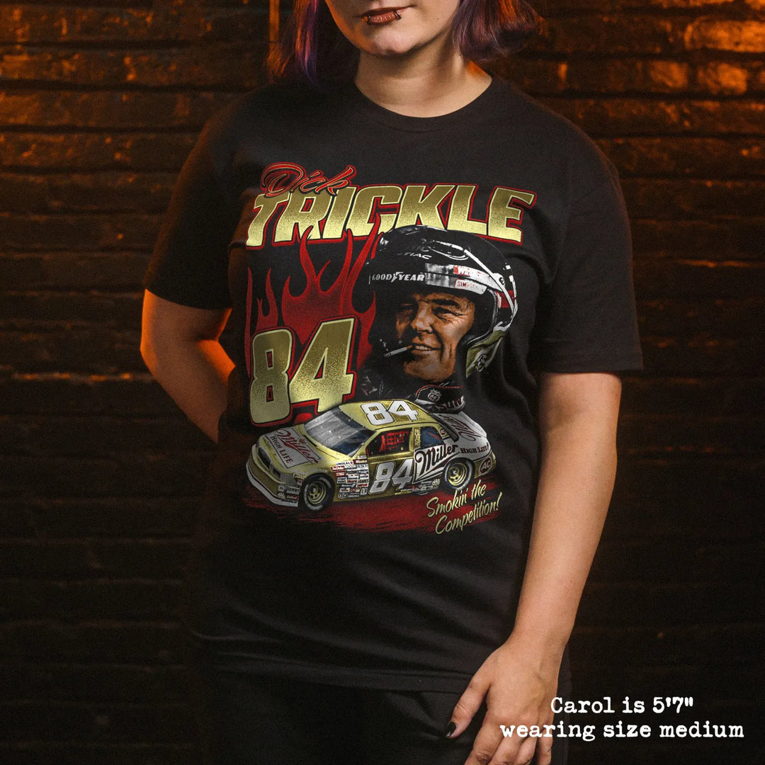 Model wearing black premium tee with dick trickle graphic 