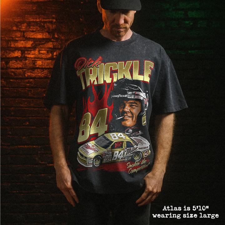 Male model wearing stone wash heavy tee with dick trickle graphic 