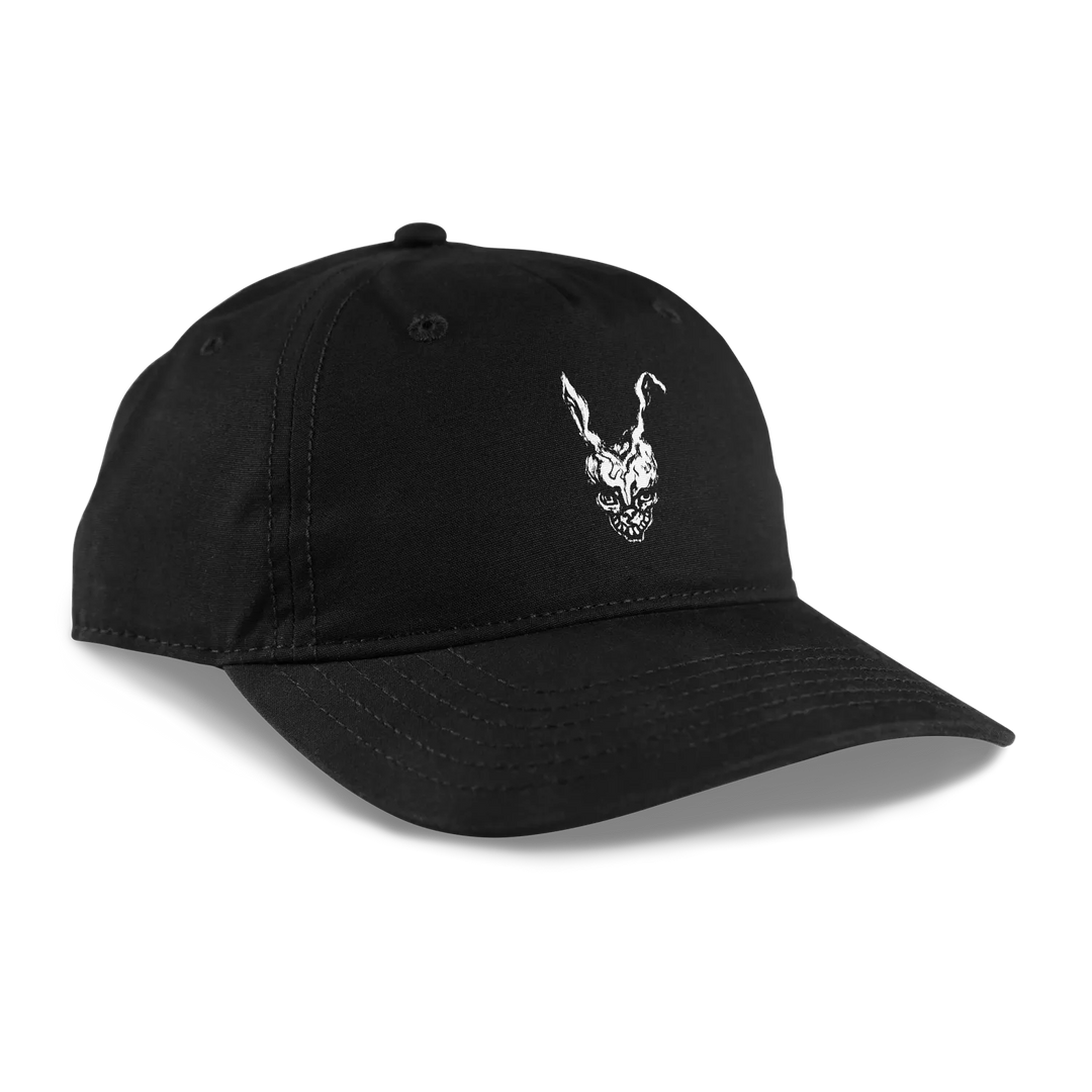 A black unstructured cap featuring a white graphic of Frank from Donnie Darko 