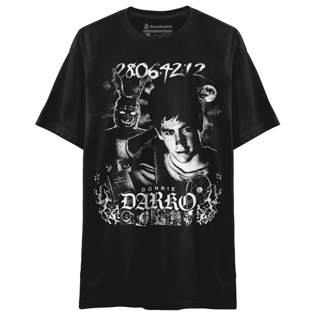 A black short-sleeve graphic t-shirt featuring a high-contrast white print of Donnie Darko, including the bunny, the text &