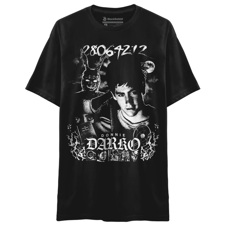A black short-sleeve graphic t-shirt featuring a high-contrast white print of Donnie Darko, including the bunny, the text &