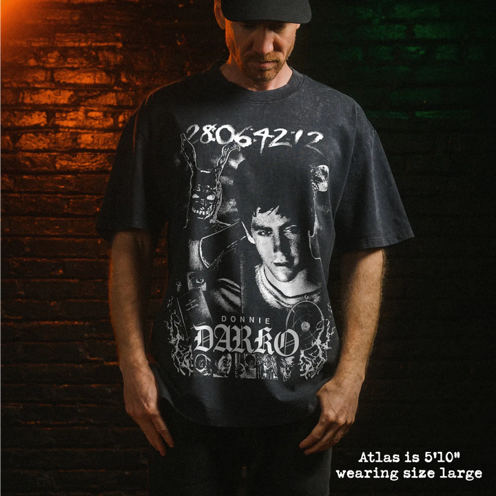 Model wearing heavy tee with Donnie Darko graphic 