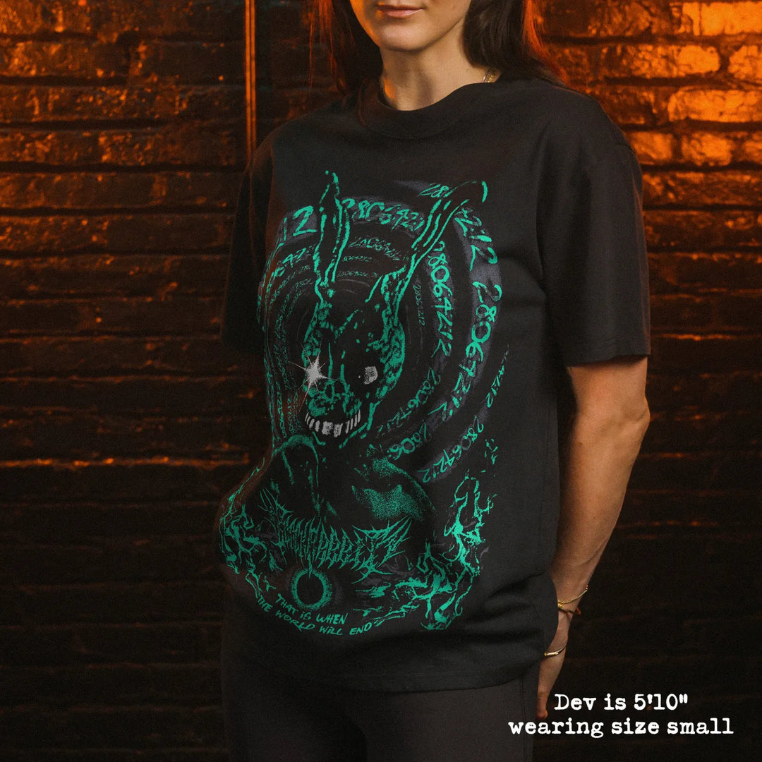 Model wearing heavy tee with Donnie Darko graphic 
