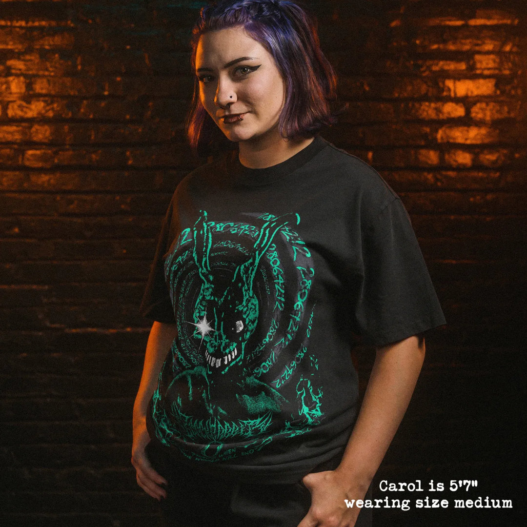 Model wearing heavy tee with Donnie Darko graphic 