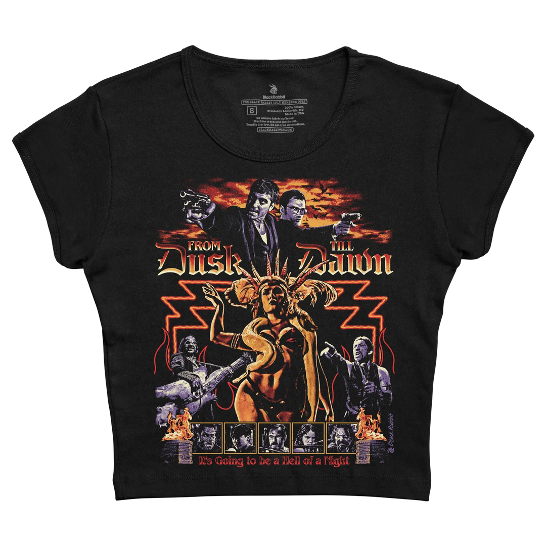 Black short-sleeved t-shirt featuring a vibrant graphic of the ’from dusk till dawn’ movie poster with red and orange accents. 