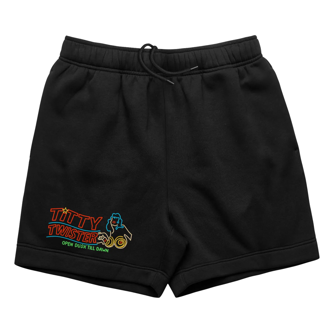 Black shorts with ’titty twister’ logo and neon text design.