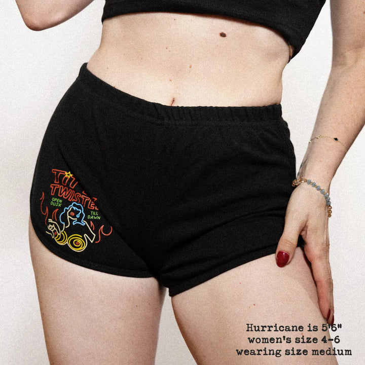 Female model wearing the Black / Black variant of Black Rabbit&