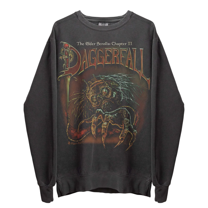 Dark gray long-sleeved crewneck sweatshirt with a colorful graphic print of ’The Elder Scrolls: Chapter II Daggerfall’ featuring a monster.