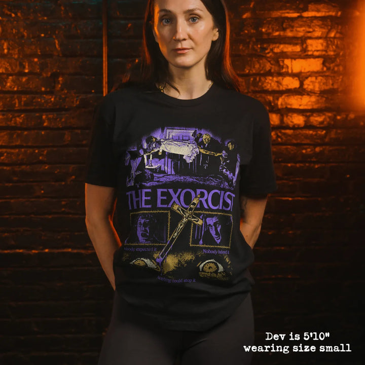 model wearing black premium tee with exorcist graphic 