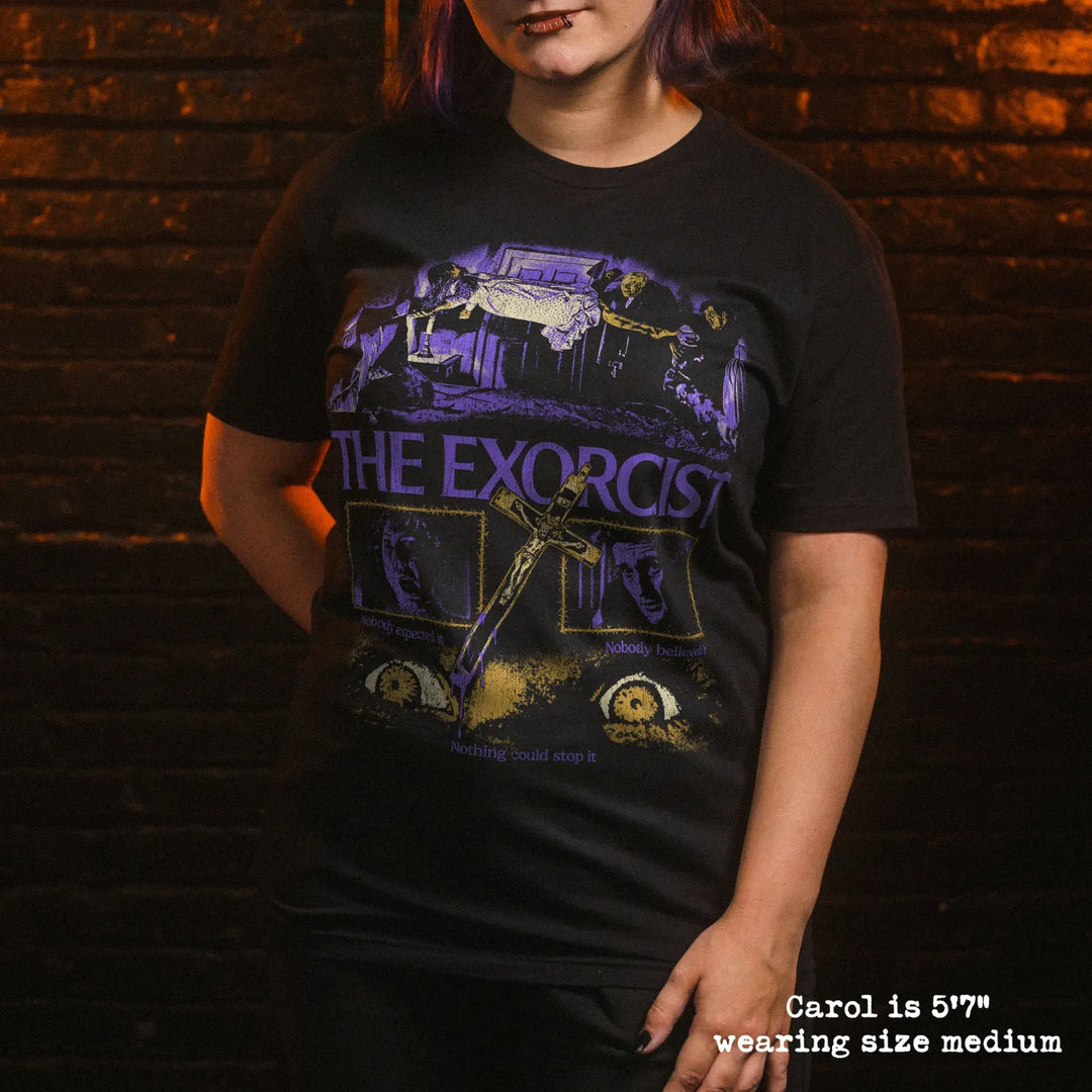 model wearing black premium tee with exorcist graphic 