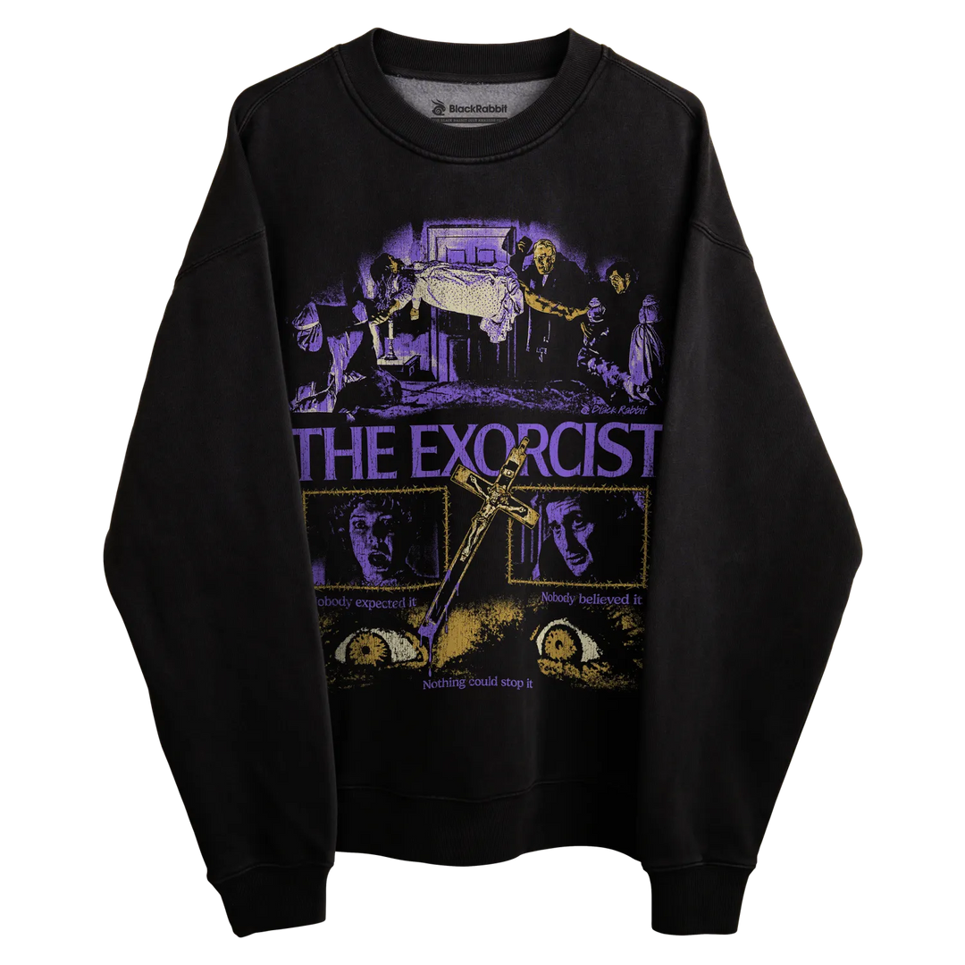 Black long-sleeved sweatshirt with ’the exorcist’ graphic design featuring scenes from the movie.