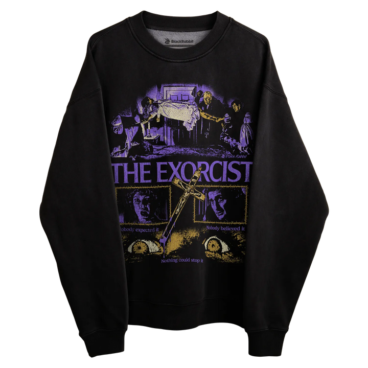 Black long-sleeved sweatshirt with ’the exorcist’ graphic design featuring scenes from the movie.