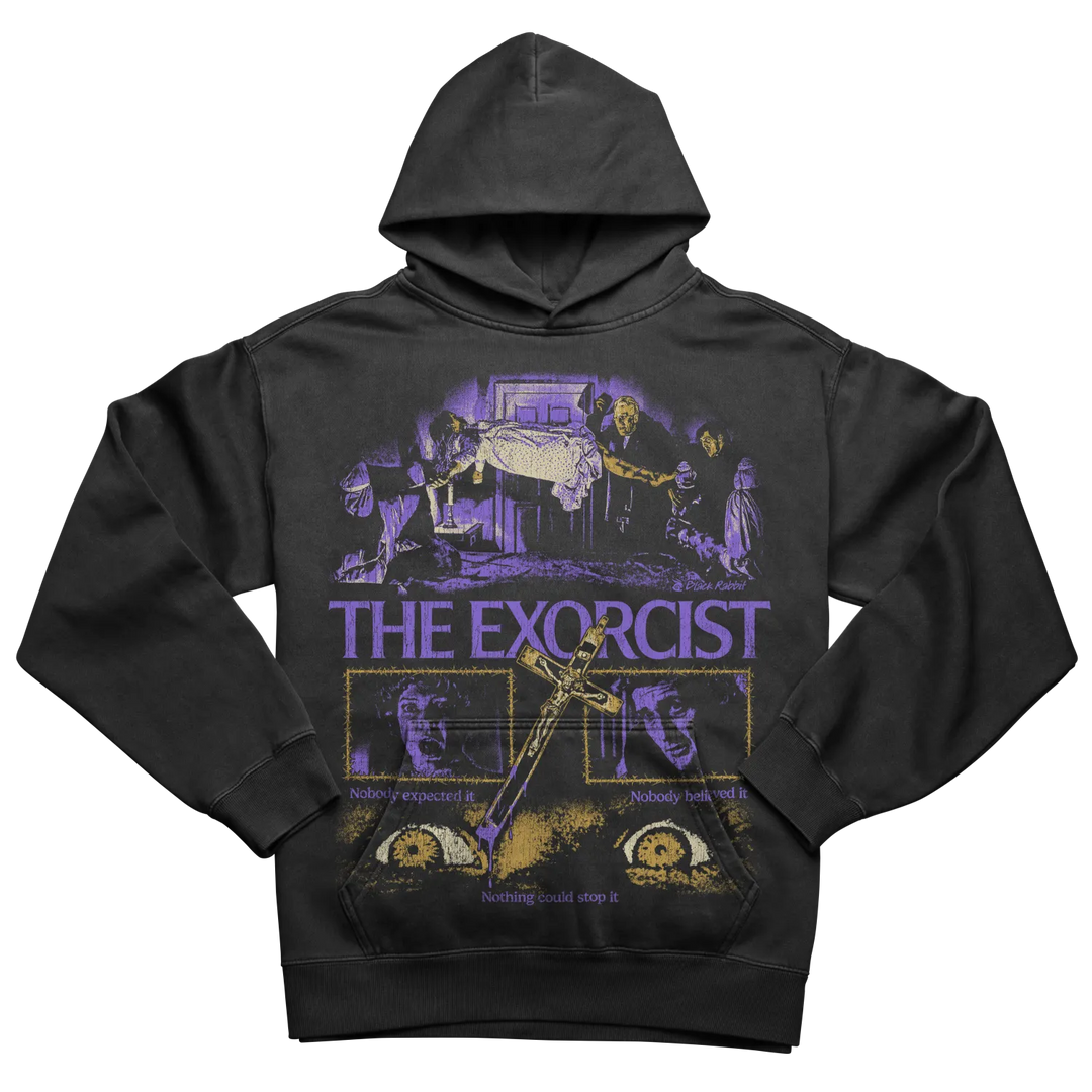 Black hoodie with a vivid ’The Exorcist’ graphic print.