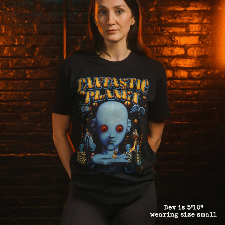 model wearing black premium tee with fantastic planet graphic 
