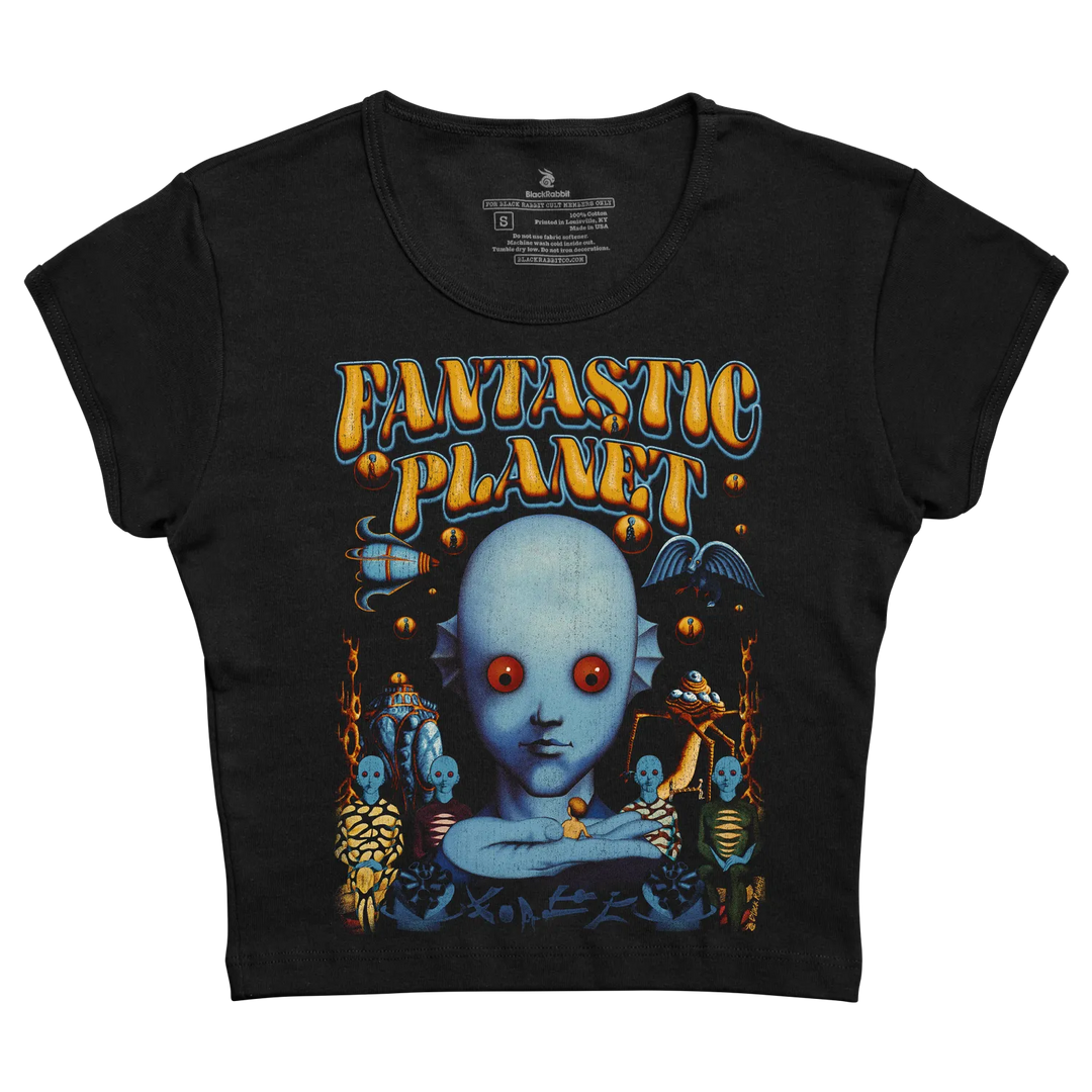 Black short-sleeved t-shirt featuring a vibrant ’fantastic planet’ graphic with a blue alien face, orange text, and surreal creatures.