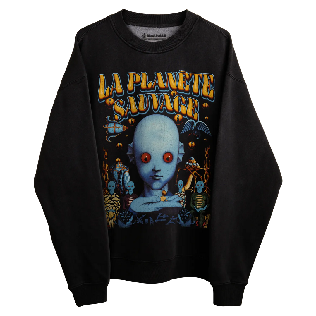 Black long-sleeved sweatshirt with ’la planète sauvage’ graphic design featuring a surreal alien head and various cosmic elements.