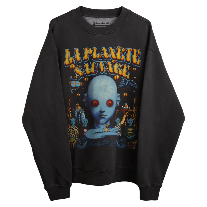 Black sweatshirt with ’la planète sauvage’ graphic design featuring a surreal, alien-like face and various creatures.