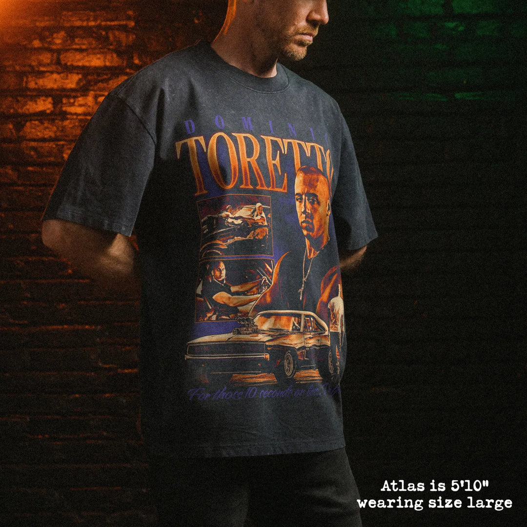 Male model wearing stone wash heavy tee with toretto graphic 