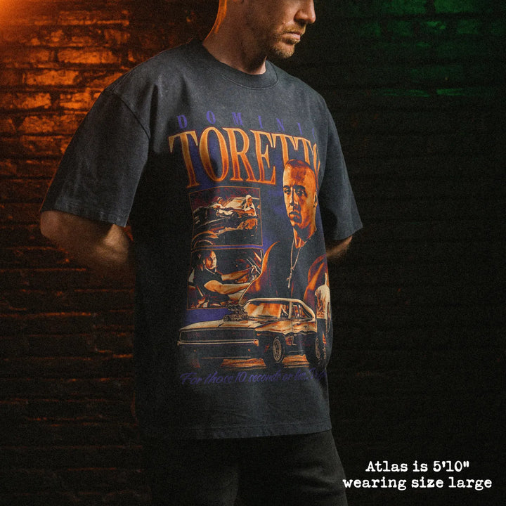 Male model wearing stone wash heavy tee with toretto graphic 