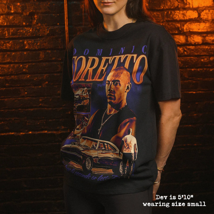 Model wearing heavy tee with toretto graphic 