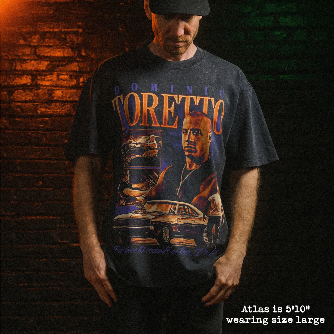 Male model wearing stone wash heavy tee with toretto graphic 