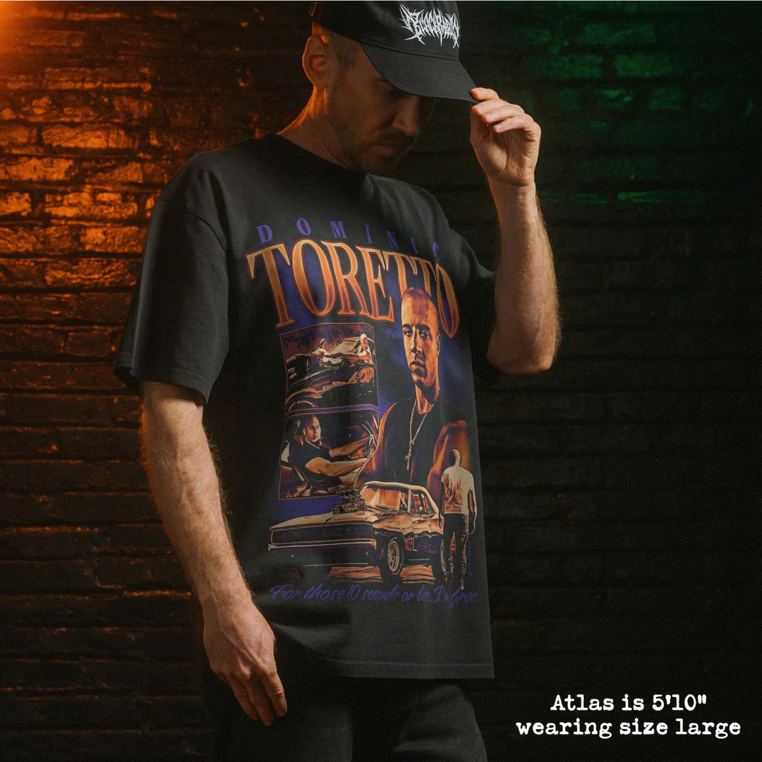 Model wearing heavy tee with toretto graphic 