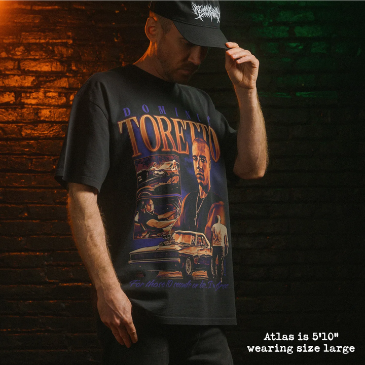 Model wearing heavy tee with toretto graphic 