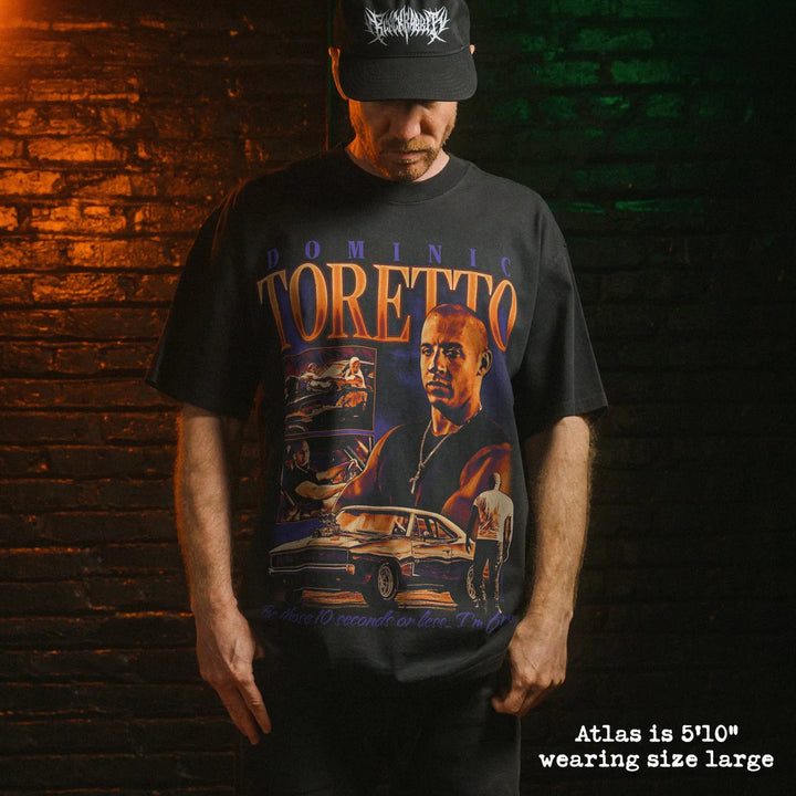 Model wearing heavy tee with toretto graphic 