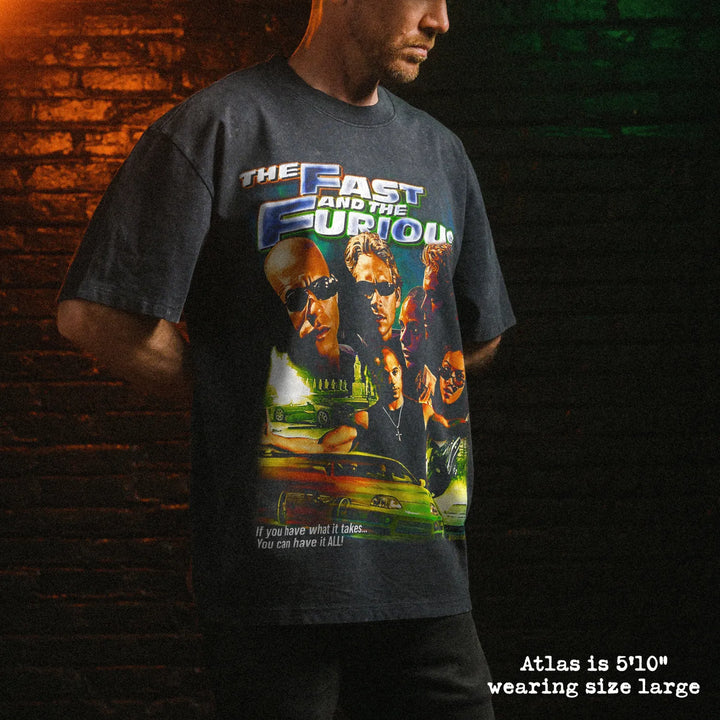 Male model wearing stone wash heavy tee with fast and furious graphic 