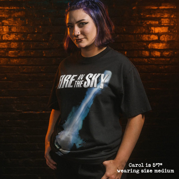 Model wearing heavy tee with fire in the sky graphic 