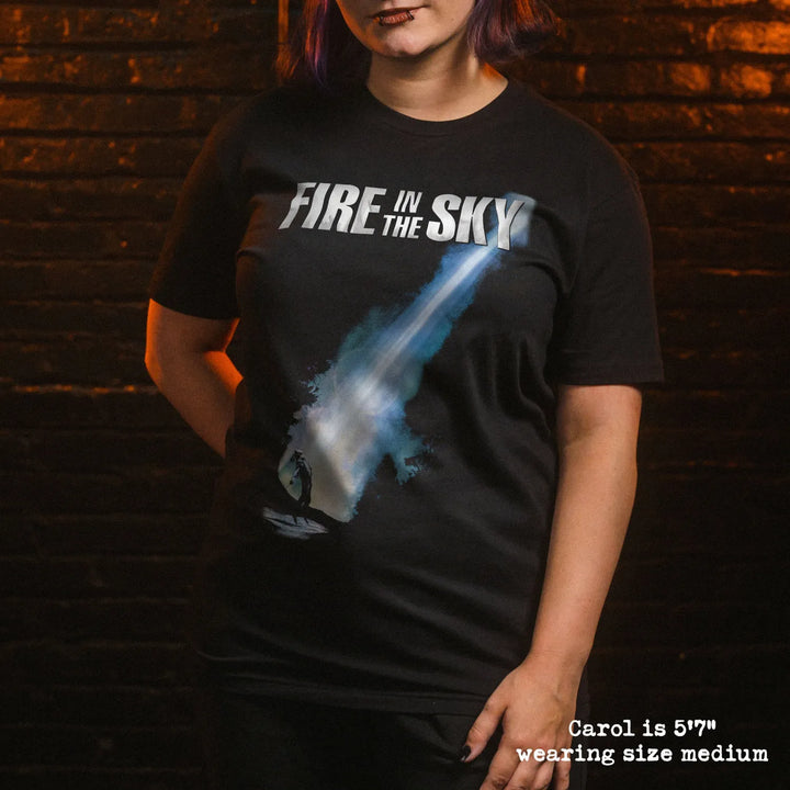 model wearing black premium tee with fire in the sky graphic 