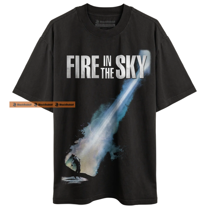 Black t-shirt with ’Fire in the Sky’ graphic.