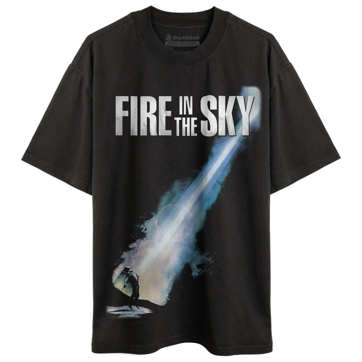Dark gray t-shirt with a graphic of a person looking at a bright, streaking light.
