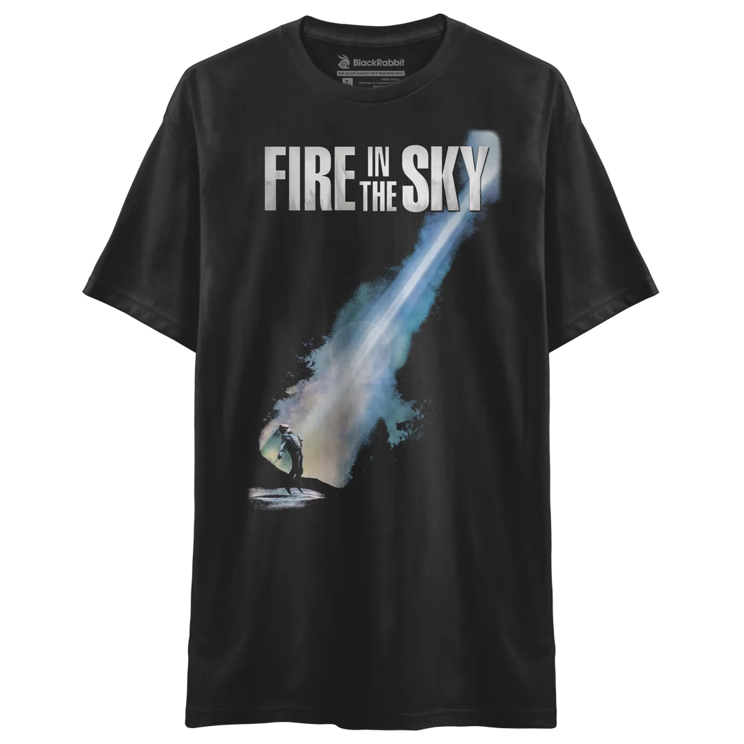 Black short-sleeved t-shirt with a graphic of a person looking at a bright, blue-white beam of light in the sky.