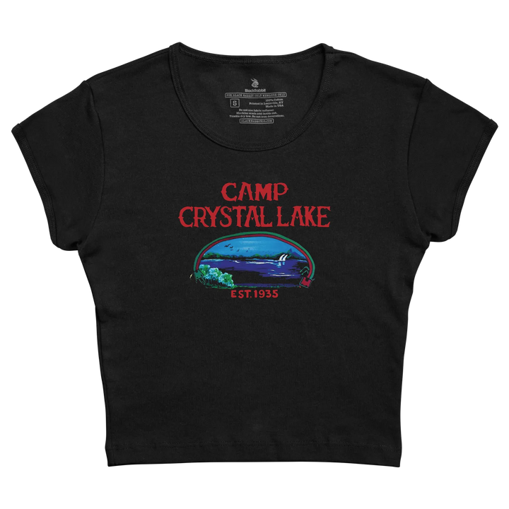 Black cropped t-shirt featuring a red ’camp crystal lake’ graphic with an illustrated lake scene and ’est.