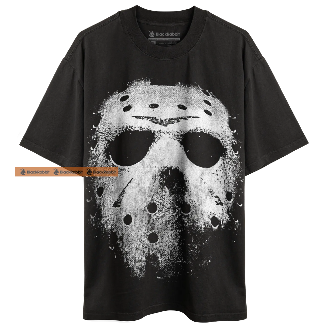 Black t-shirt with Jason Voorhees mask graphic.
