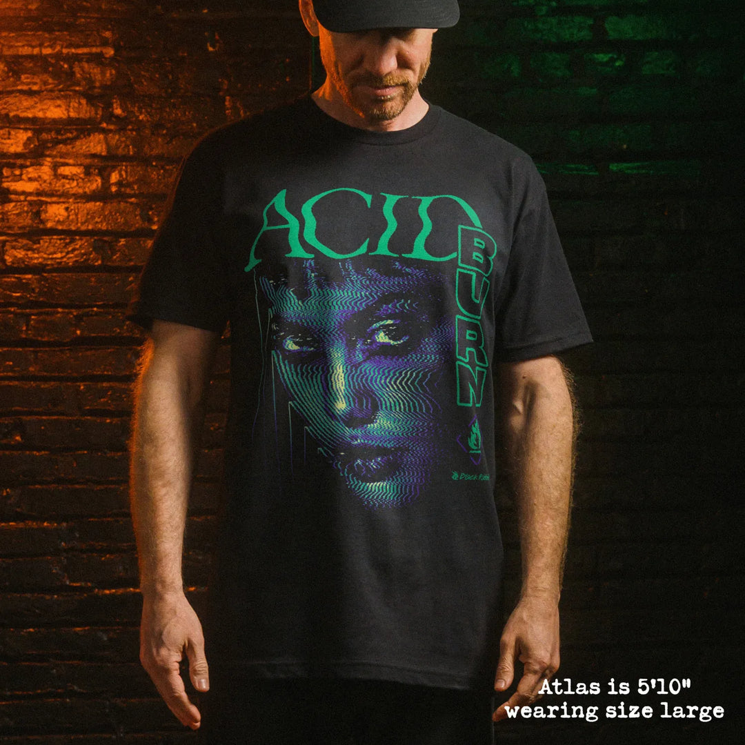 Male model wearing black premium tee with acid burn graphic 