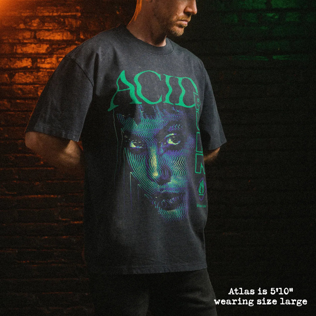 Male model wearing stone wash heavy tee with acid burn graphic 