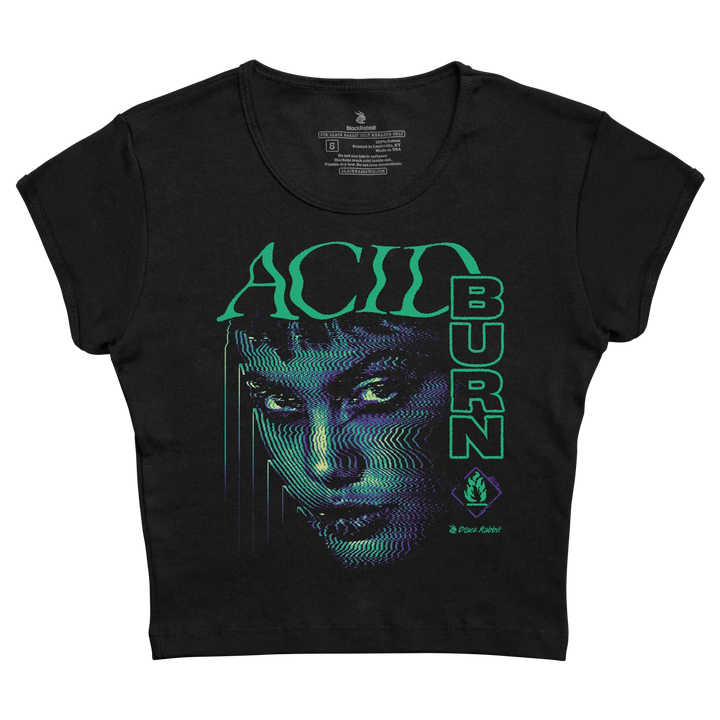 Black cropped t-shirt featuring a vibrant neon green and blue digital-art face design with the words ’acid burn’ printed vertically in matching glowing letters.
