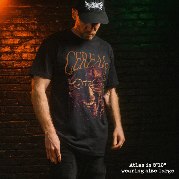 Male model wearing black premium tee with cereal killer graphic 