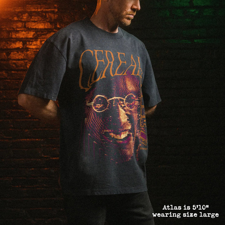 Male model wearing stone wash heavy tee with cereal killer graphic 