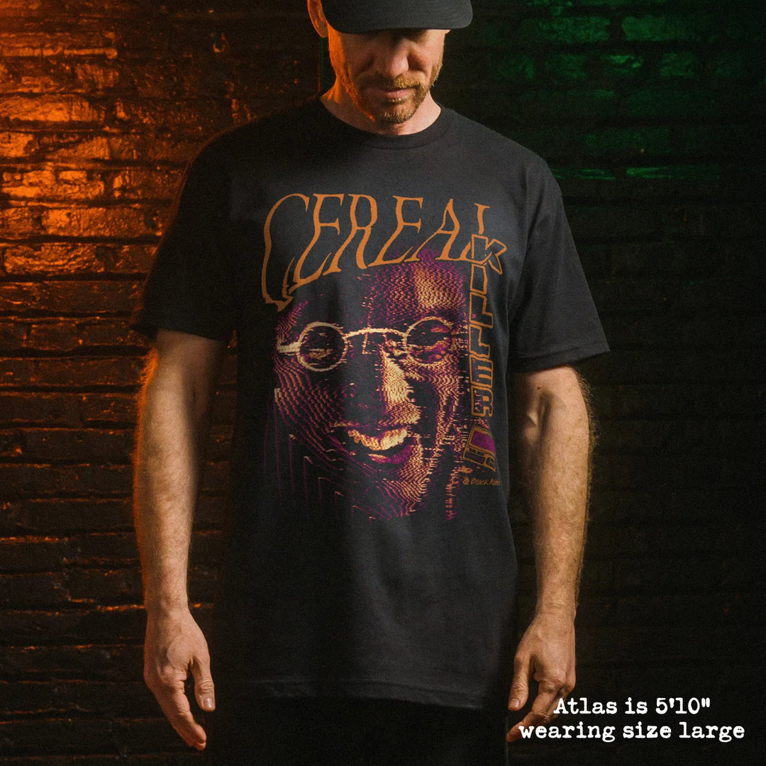 Male model wearing black premium tee with cereal killer graphic 