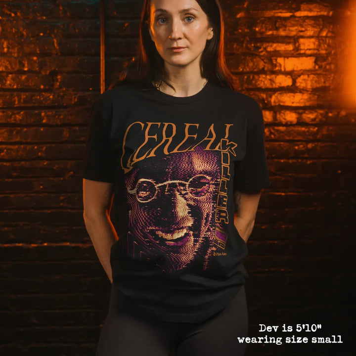 model wearing black premium tee with cereal killer graphic 