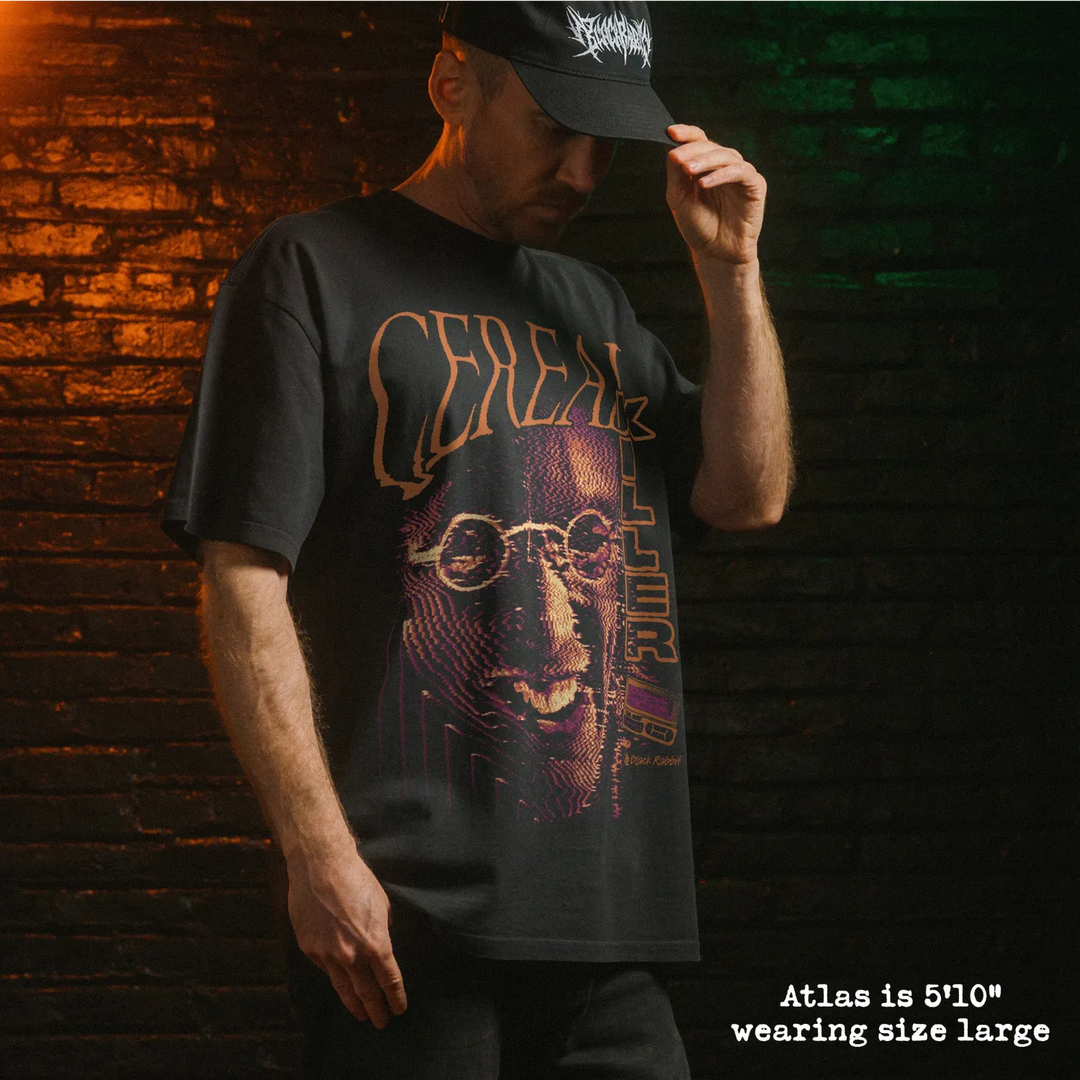 Male model wearing heavy tee with cereal killer graphic.
