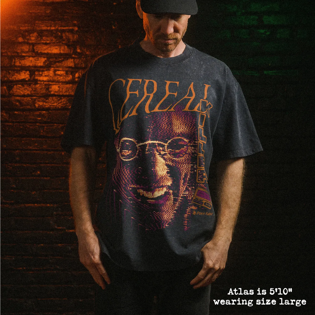 Male model wearing stone washed heavy tee with cereal killer graphic.
